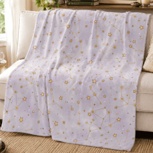 Soft lavender fleece blanket featuring delicate golden constellations and twinkling stars on a dreamy celestial background.